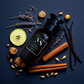 a bottle Parfums-De-Marly-Layton-Inspired surrounded with apple, cinnamon, cardamom etc