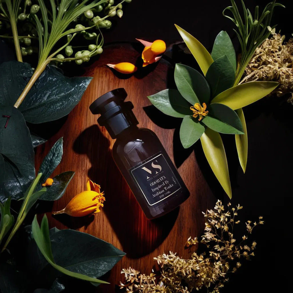 bottle of Arabina tonka inspired perfume - Odorata surrounded with its ingredients 